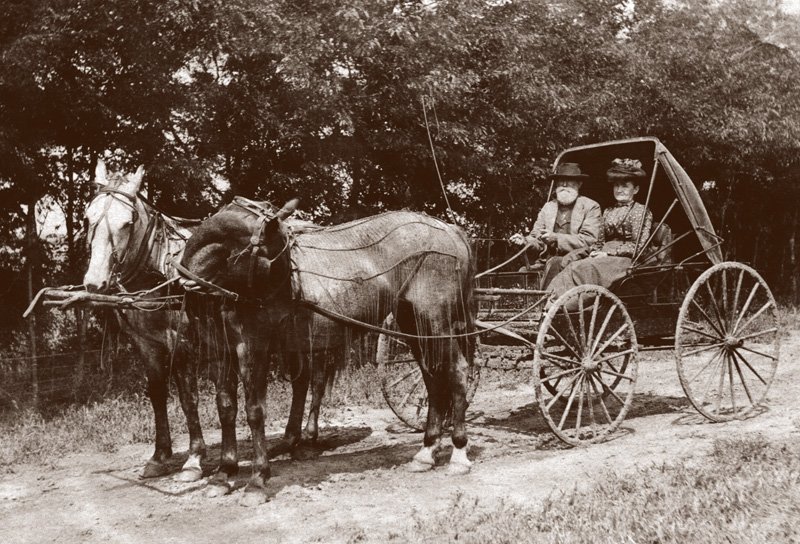Alex and Margaret Hogg taking a buggy ride.
