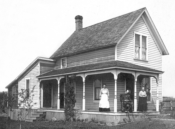 The Henschel home in Snohomish, Washington. Shown are Matilda and 
John. The older woman is identified as 