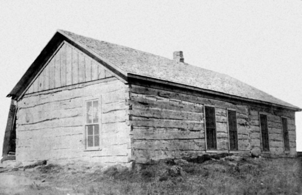 Original log house on the Rogers' Ranch.